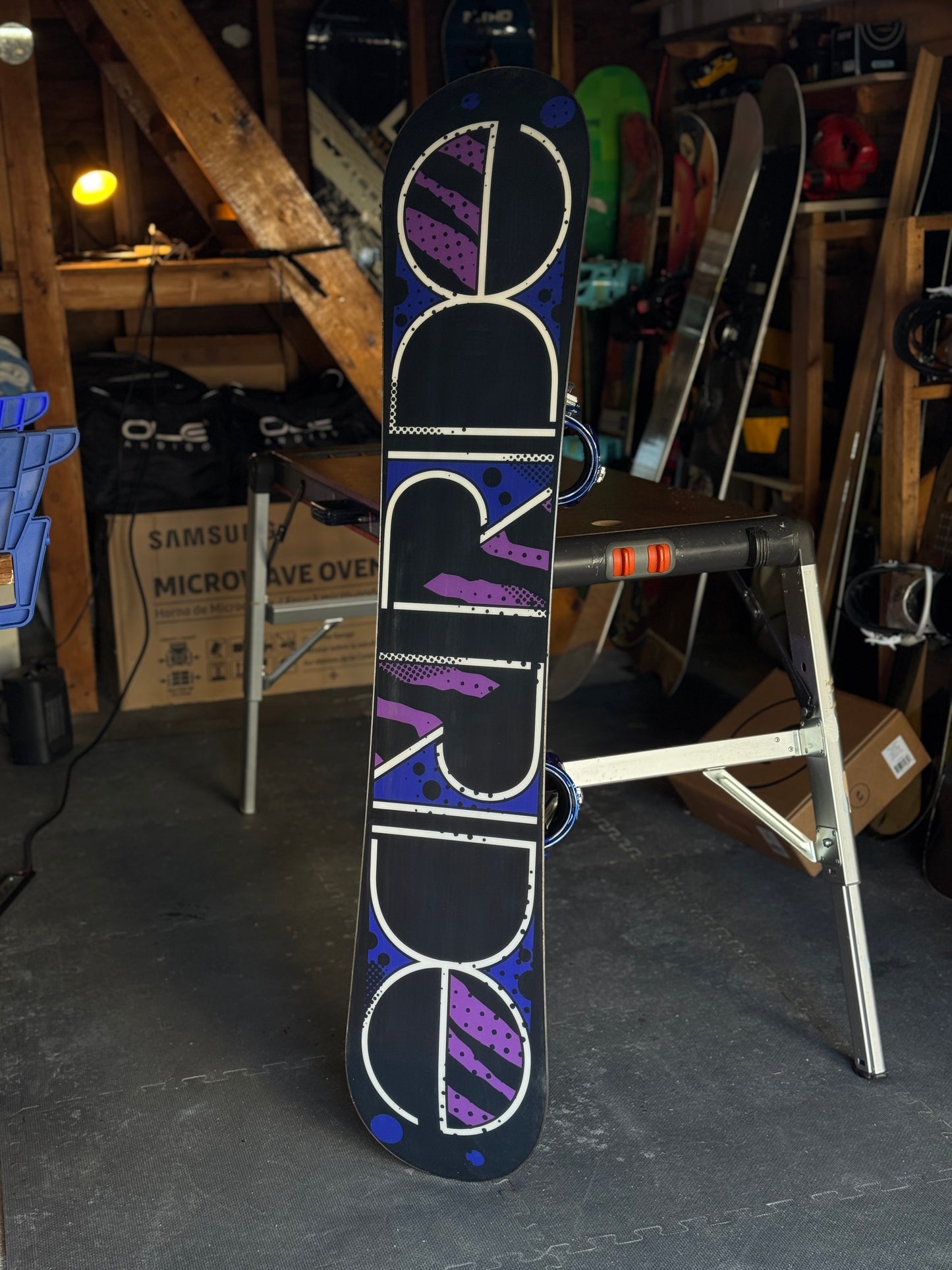 Ride Compact series 147 snowboard w/ Ride bindings size Small.