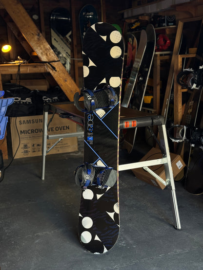 Ride Compact series 147 snowboard w/ Ride bindings size Small.