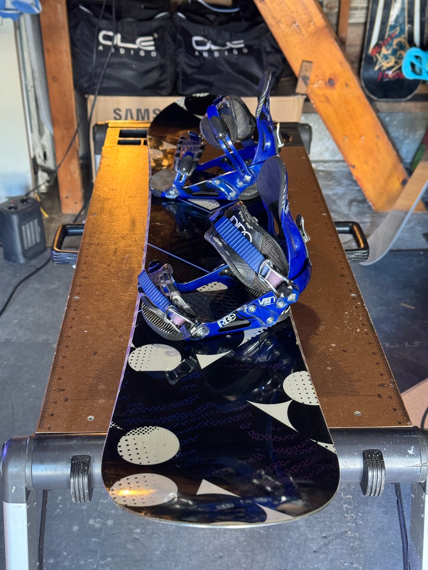 Ride Compact series 147 snowboard w/ Ride bindings size Small.