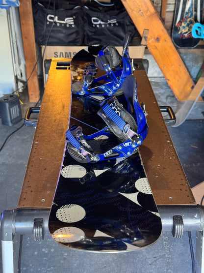 Ride Compact series 147 snowboard w/ Ride bindings size Small.