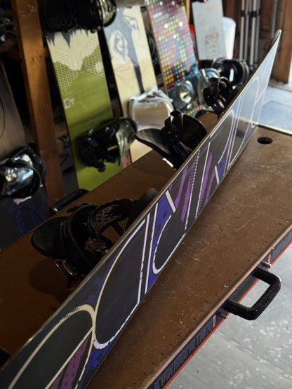 Ride Compact series 147 snowboard w/ Ride bindings size Small.