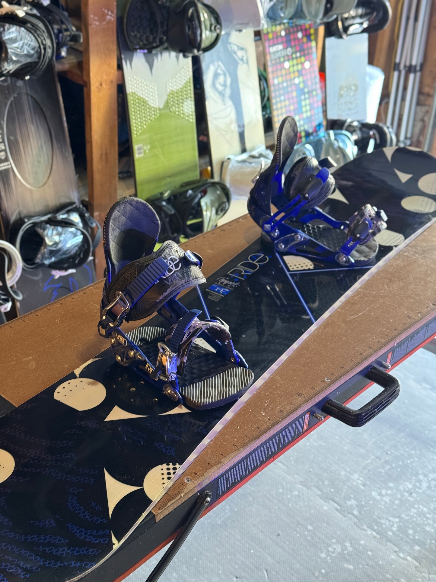 Ride Compact series 147 snowboard w/ Ride bindings size Small.